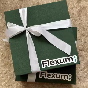 Flexum gift boxes tied with a ribbon