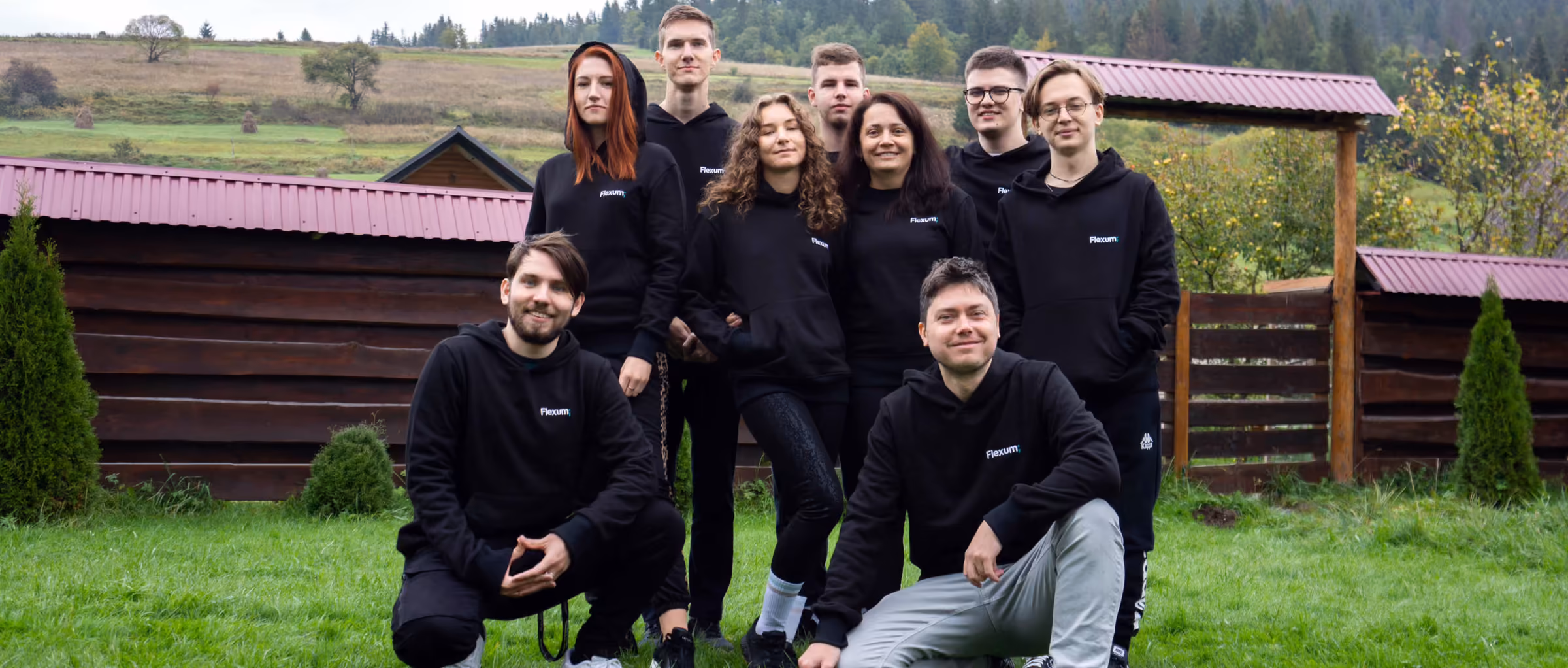 Flexum team in matching hoodies outdoors