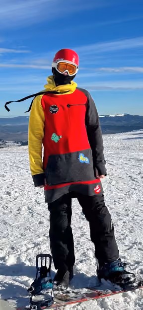Team member snowboarding